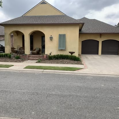 Restored curb appeal after Precision Wash Co. cleaned the siding, trim and concrete walkways.
